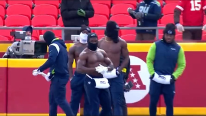 The crazy warm-up that's sweeping the NFL: Seattle Seahawks players go  topless at 10 degrees Fahrenheit!
