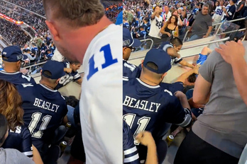 A Cowboys fan fights Eagles fan in the stands